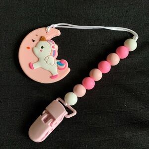 Pink half moon teething set